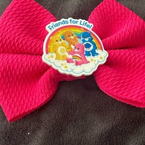 Hot Pink Hair Bow with Care Bears 'Friends for Life' Badge